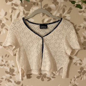 white knit cropped button up crop top. very small stain on the back,